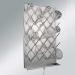 stainless steel pegboard with pegs and drip trough